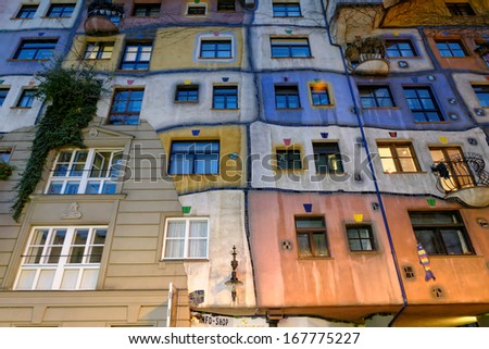 VIENNA, AUSTRIA - NOVEMBER 23: Hundertwasser Haus at night on November 23, 2013 in Vienna. The iconic building was finished in 1985 and is one of finest examples of expressionist architecture.