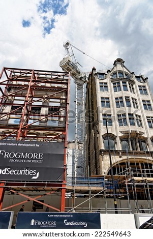 LONDON - JULY 1, 2014: Huge construction site at Oxford street in London near Tottenham Court Road station and the new Primark store. City of London is one of the leading centres of global finance.