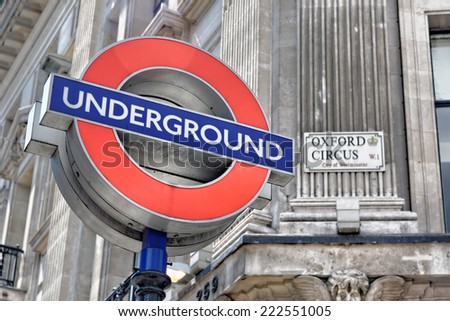 LONDON - JULY 1, 2014: London underground sign at Oxford Circus Station, with the focus on the Underground sign.