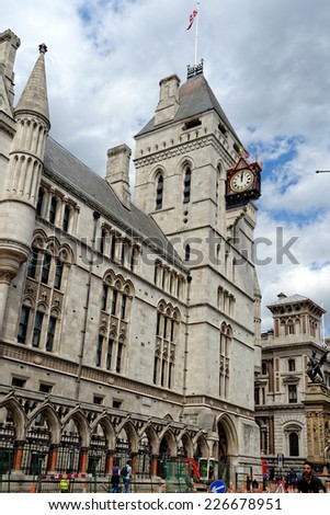 LONDON, UK -  JULY 1,  2014 : Royal courts of justice in London, commonly called the Law Courts, was built in the 1870 and were opened by Queen Victoria in December 1882.