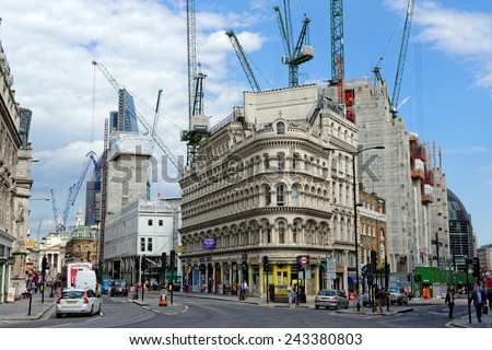 LONDON, UK - JULY 1, 2014: Many new developments under construction in the City of London, one of the leading centers of global finance.