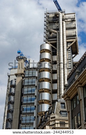 LONDON, UK - JULY 1, 2014: The Lloyd\'s Building, also known as The Inside-Out Building, home of insurance institution Lloyd of London. Like Pompidou Centre in Paris Lloyd was designed by Rogers 1986.