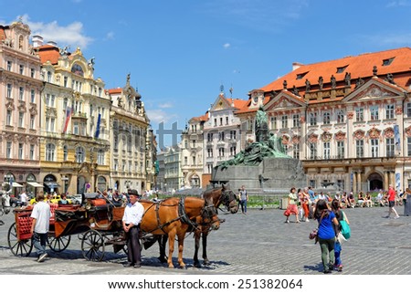 PRAGUE, CZECH REPUBLIC - JULY 03, 2014: Horse Carriage waiting for tourists at the Old Town Square in Prague.