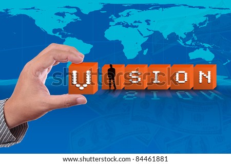 Business man pick up vision word push down on world map background