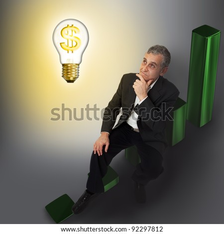 Business man sitting on growth pie graph and thinking for big business idea