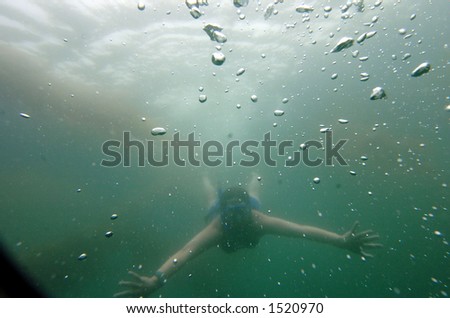 lady swims in ocean