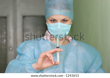 The nurse with a syringe