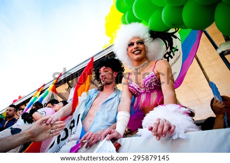 ROME, ITALY - JUNE 11 2011. Euro gay pride day, parade people on city streets during the demonstration