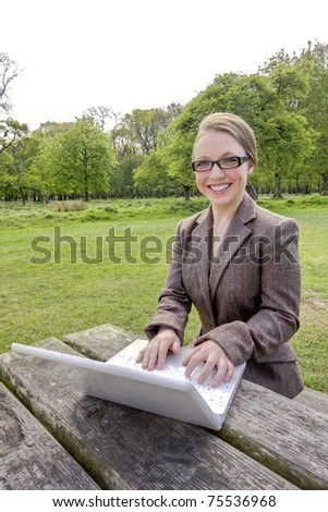 businesswoman with laptop enjoy works wireless outdoor