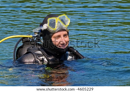Series of images of Scuba Divers preparing to enter the water.