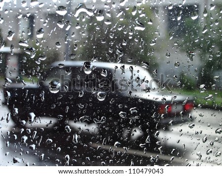 background with car window after rain (with water drops)