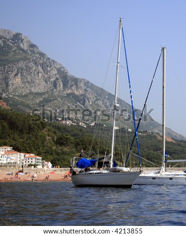 Small sailboat in a Budva harbor (Montenegro, Adriatic sea).