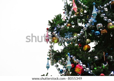 A decorated Christmas tree on white background (isolated on white).