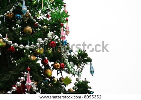 A decorated Christmas tree on white background (isolated on white).