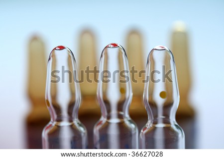Close-up of ampoules containing pharmaceutical products