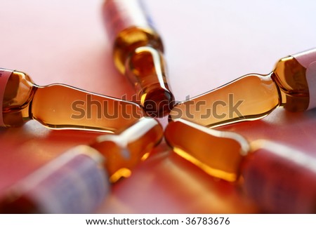 Close-up of ampoules containing pharmaceutical products