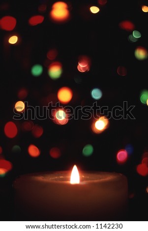 A candle in front of a Christmas tree, which was set back a ways to defocus. Taken with a 35mm film camera long ago.