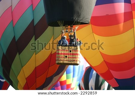 A pilot negotiating a crowded launch at the Albuquerque International Balloon Fiesta 2005.