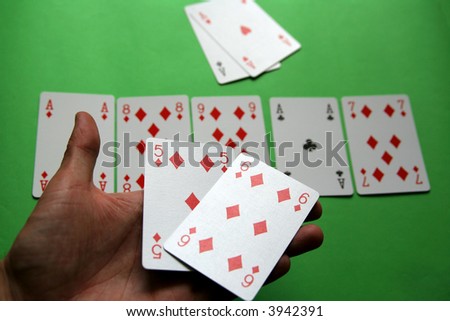 poker - win,  on table five cards: ace, 9, 8, 7 diamonds and ace club, hand: 5, 6 diamond opposition hand (on table): aces heart and spade four of a kind Aces lose with poker diamond