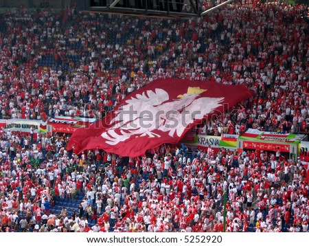 Polish flag on the stadion -  all inscription means city of Polish fans