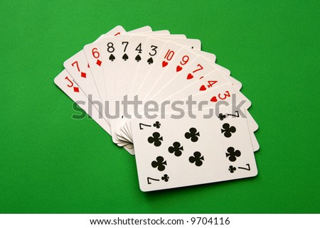 stock-photo-bridge-cards-one-hand-spades-hearts-j-diamonds-club-background-9704116.jpg