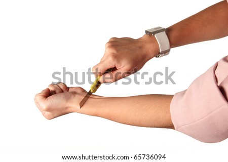 stock-photo-attempt-suicide-with-blade-65736094.jpg