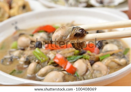 Oyster in black bean sauce   - A Popular Taiwan seafood                    prawn and chop sticks