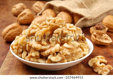 Walnut kernel  in a white bowl