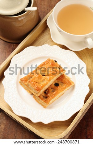 Maple sugar raisins multi-layer  biscuits on white plate
