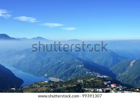 view from mountains to the valley covered with smog