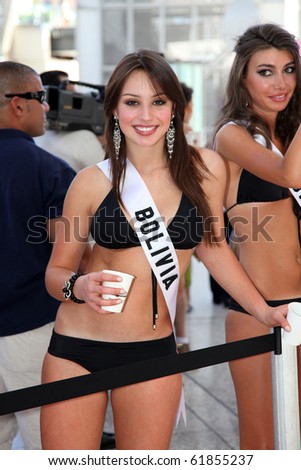 LAS VEGAS - AUGUST 11: Claudia Arce, Miss Bolivia 2010 asks for donations at Lemonade Stand at Fashion Show Mall to benefit the Nevada Cancer Institute on August 11, 2010 in Las Vegas