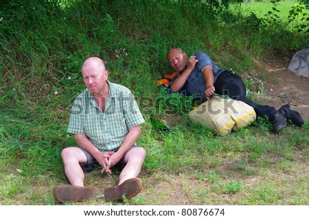 MOSCOW, RUSSIA - JULY 06: Unidentified older homeless men shown on July 06, 2011 in Park Kuzminki, Moscow, Russia. Lack of adequate housing for the elderly has led to a growing homeless population in Moscow.