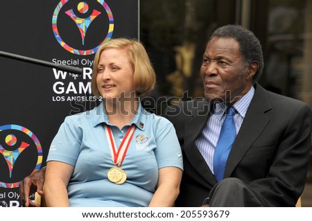 GLENDALE, CA JULY 17, 2014: Debi Anderson, Special Olympics World Games Special Messenger and Olympic legend Rafer Johnson welcome Glendale as a host town for the 2015 World Games in Los Angeles.