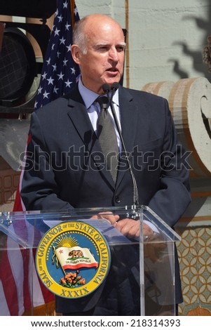 HOLLYWOOD, CA - SEPTEMBER 18, 2014: Governor Jerry Brown at podium speaks about California jobs at the signing of the California Film and TV Job Retention Act in Hollywood on September 18, 2014.
