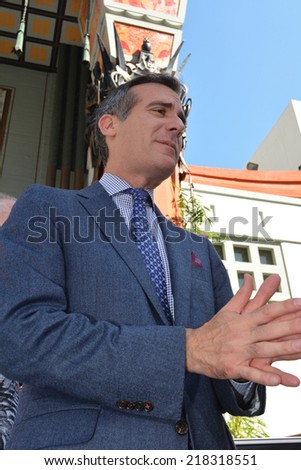 HOLLYWOOD, CA - SEPTEMBER 18, 2014: Low angle shot of Los Angeles Mayor Eric Garcetti attending the signing of the California Film and Television Job Retention Act in Hollywood on September 18, 2014.