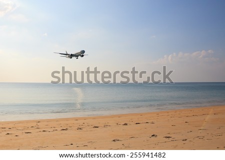 Phuket,Thailand - February 21, 2015: Qatar airplane landing at Phuket international airport on February 21, 2015. The plane comes in Phuket international airport.