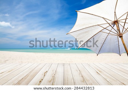 White umbrella beach.