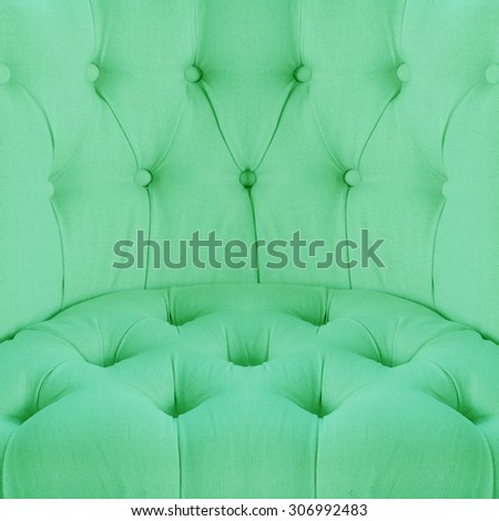 Green color sofa cloth texture with buttons