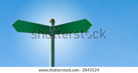 Customizable green street sign on a clear blue sky