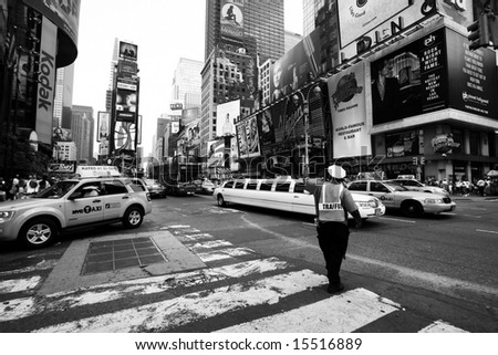 NEW YORK - UNKNOWN: A NYC traffic officer directs traffic in this undated image taken in New York City's Times Square area.