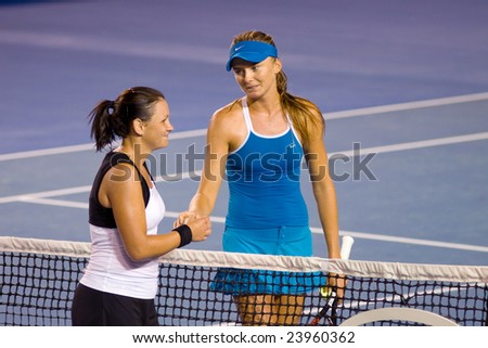 MELBOURNE - JANUARY 19: Slovakian Daniela Hantuchova and Australian Casey Dellacqua, at the Australian Open on January 19, 2009 in Melbourne Australia.