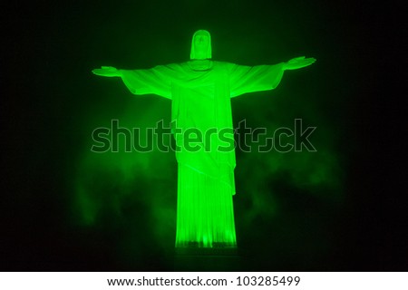 RIO DE JANEIRO, RJ/Brazil - MARCH 01 2011. Christ the Redeemer testing it\'s new led light in a fog night. Located on top of Corcovado, Rio\'s highest mountain on march 01, 2011 in Rio de Janeiro.