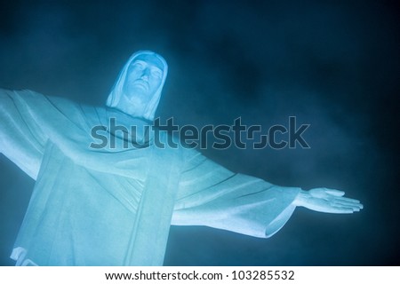 RIO DE JANEIRO, RJ/Brazil - MARCH 01 2011. Christ the Redeemer testing it\'s new led light in a fog night. Located on top of Corcovado, Rio\'s highest mountain on march 01, 2011 in Rio de Janeiro.
