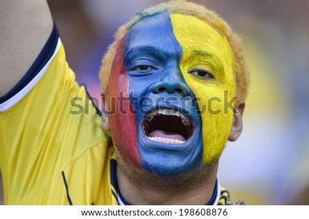 BELO HORIZONTE, BRAZIL - June 14, 2014: Soccer fans celebrating at the 2014 World Cup Group C game between Colombia and Greece at Mineirao Stadium.