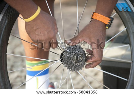 Worker reparing a crown in a bicicle race