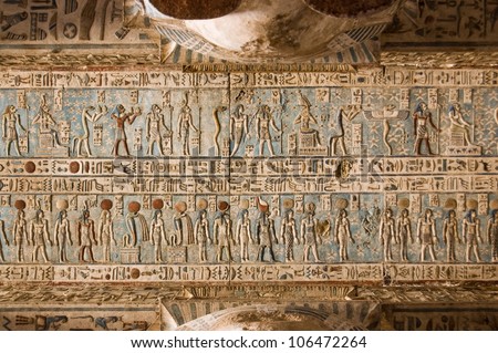Carved and painted gods of Ancient Egypt.  Ceiling at Dendera Temple, near Qena, Egypt.