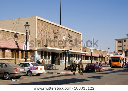 QENA, EGYPT - JANUARY 4: Commuters and security personnel at the railway station, Qena on January 4 2012.  The city is at the centre of controversy over antiquities looted during the Arab Spring.