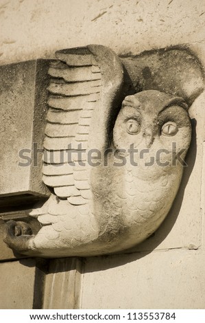 An art deco style carving of an owl on an outer wall of the West Wing of Southampton\'s Civic Centre, Hampshire.  Built in 1933 to house the city\'s police station and law courts.