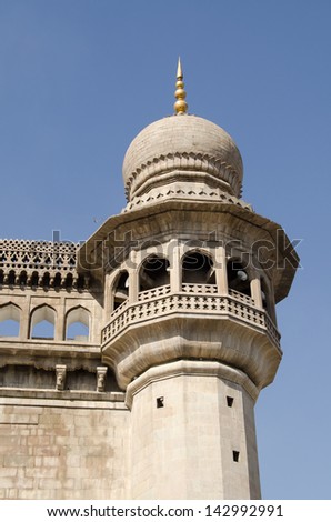 One of the minaret towers at the historic Mecca Masjid mosque in Hyderabad, India.