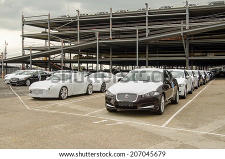 SOUTHAMPTON, UK - MAY 31, 2014:  Rows of newly-built Jaguar cars parked at Southampton docks before being exported.